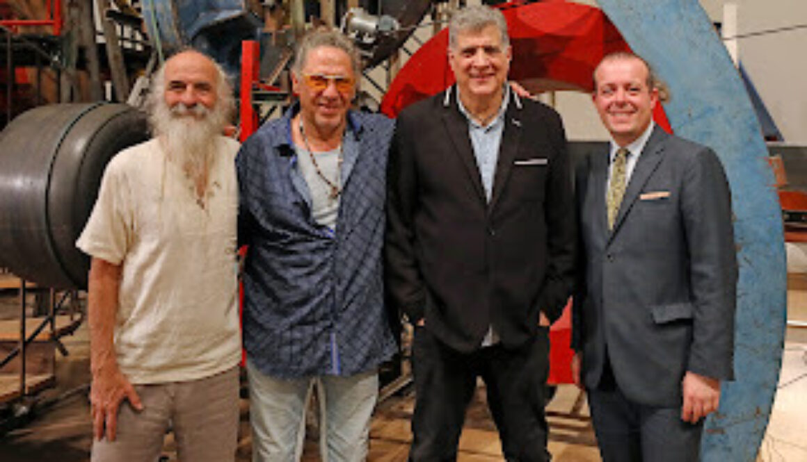 A group of men standing next to each other.